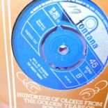 A collection of twenty 7" 45 rpm singles, The Who, The Rolling Stones, The Beatles, The Kinks,