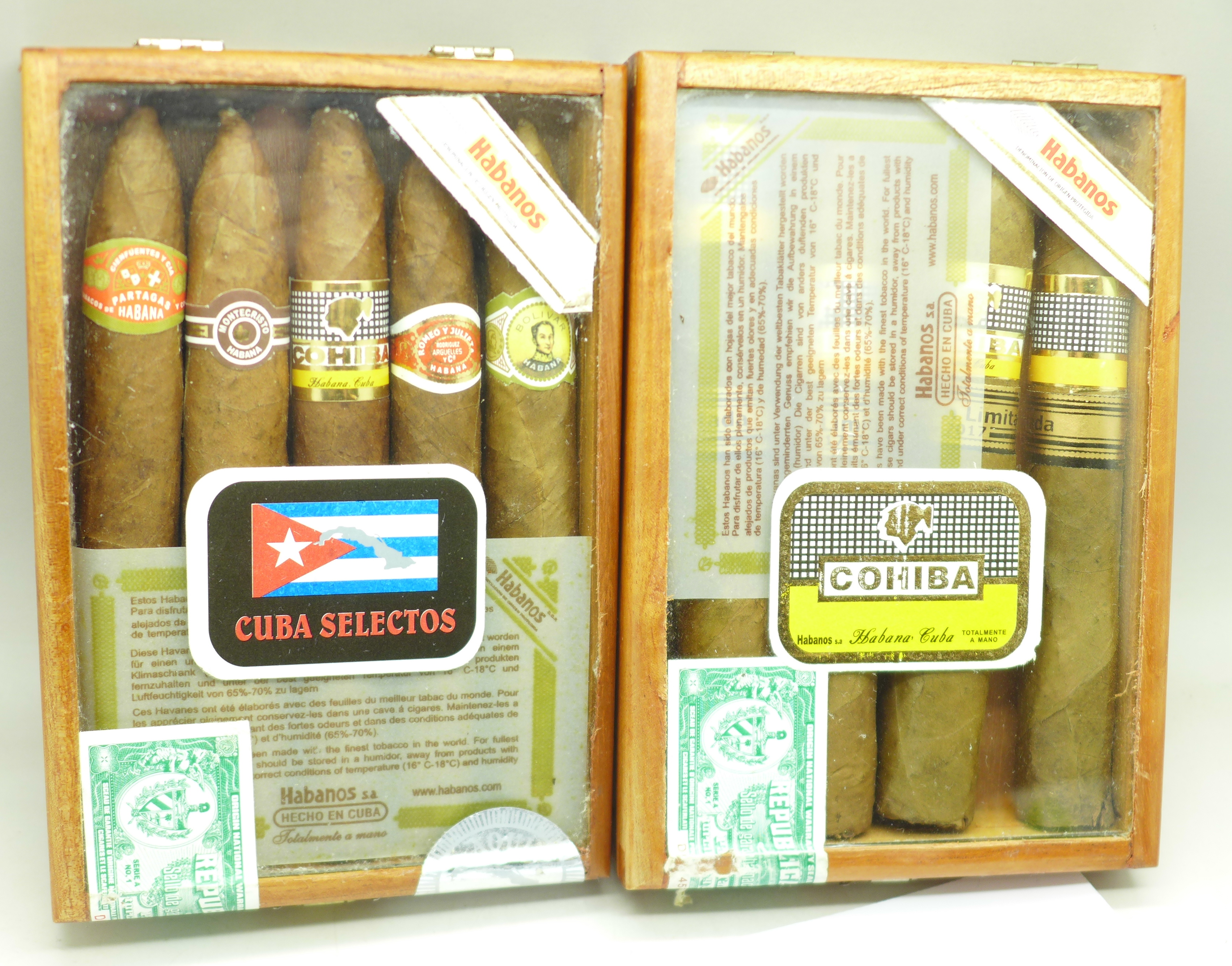 Two boxes of Cuban cigars, one box of five Cuba Selectos, sealed, and one opened box with four