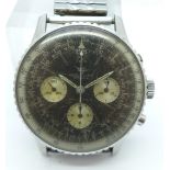 A Breitling Navitimer wristwatch, the case back marked 806-1162286, lacking one button