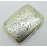 A silver cigarette case, Birmingham 1908, with initials, 63g