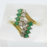 A 14ct gold, emerald and diamond ring, marked 585, 3.4g, S