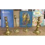 Two pairs of brass candlesticks and stamp albums