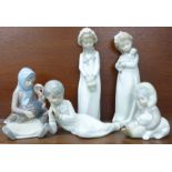 Two Lladro figures, Eskimo with polar bear cub and Girl holding a turkey plus three other Spanish