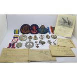 Three cloth badges, medal ribbons, Regimental badges including National Defence Company, Queen's Own