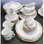 A Royal Doulton Mandalay dinner service, six setting, with sugar and cream jug, platter, two tureens