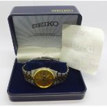 A Seiko 5 automatic day/date wristwatch, 7009-3110, with box and guarantee booklet