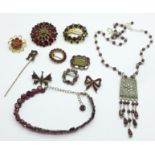 A collection of garnet set jewellery; a 19th Century mourning brooch, lacking pin, one stone a/f,