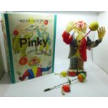 A tin-plate Japanese Pinky The Juggling Clown in a reproduction box