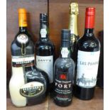 A bottle of Louis Delaunay champagne, Davy's Finest Reserve Port, two bottles of wine, etc.