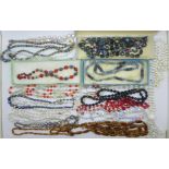 Fifteen vintage glass bead necklaces