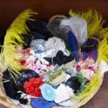 A collection of vintage millinery flowers, ostrich feathers, sequin appliques, etc.
