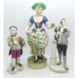 Three figures; Crown Derby figure of a lady, restoration on the left hand and skirt, a Bing &