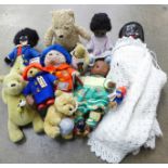 A collection of soft toys, Teddy bears, Paddington Bear and three dolls including Pedigree