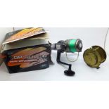 A brass fishing reel and a Top Gun RD 50 reel