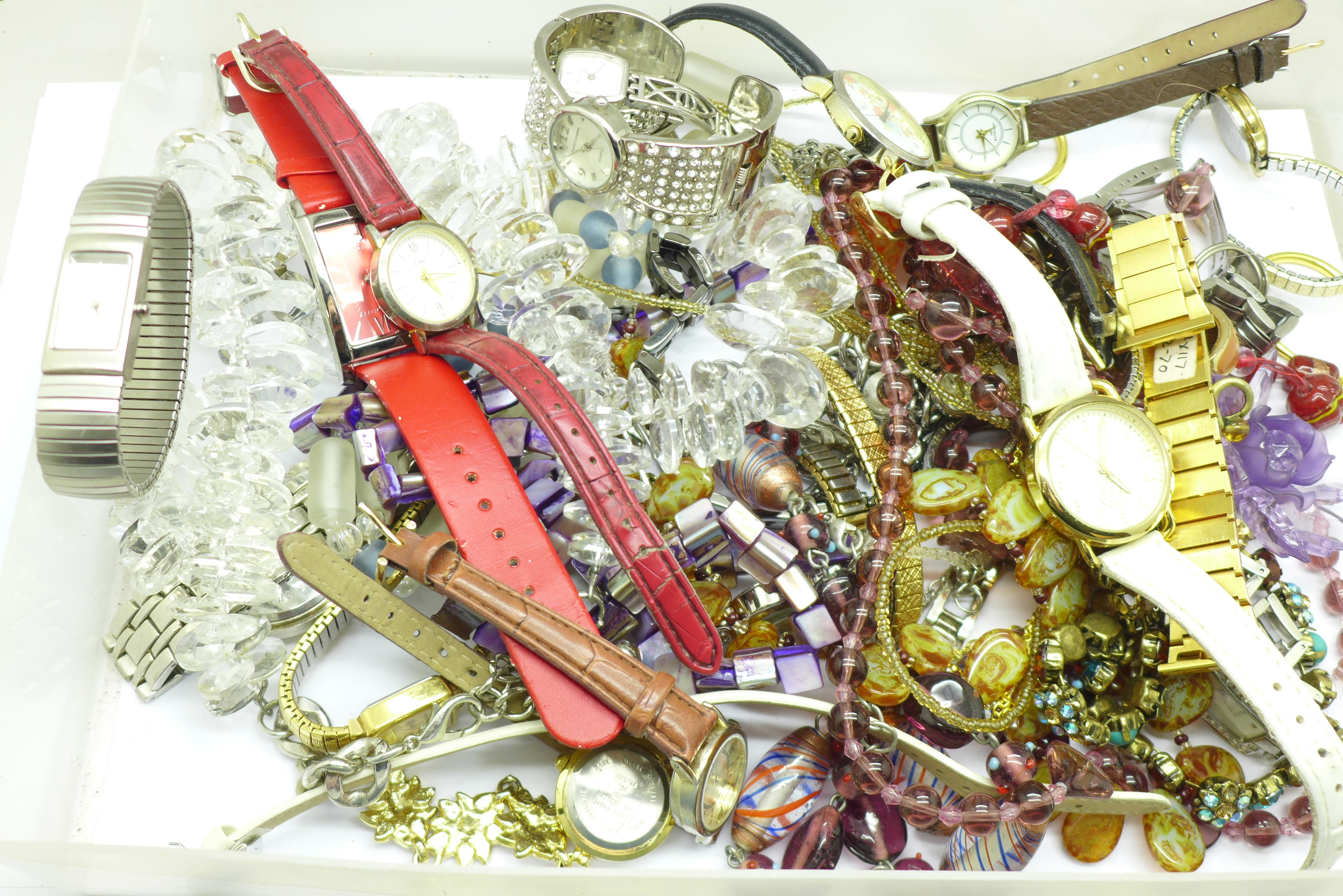 A collection of wristwatches and costume jewellery