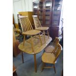 A Dinette beech kitchen table and four chairs