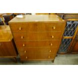 A walnut chest of drawers