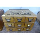 An oak table top nine drawer index filing cabinet, bearing Coats Sanitised inscription