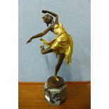 An Art Deco style gilt bronze figure of a ballerina, on green marble socle, 50cms h