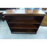 A mahogany open bookcase