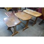 An Arts and Crafts Cotswold School walnut nest of tables