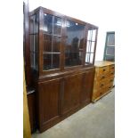 An early 20th Century mahogany shop cabinet