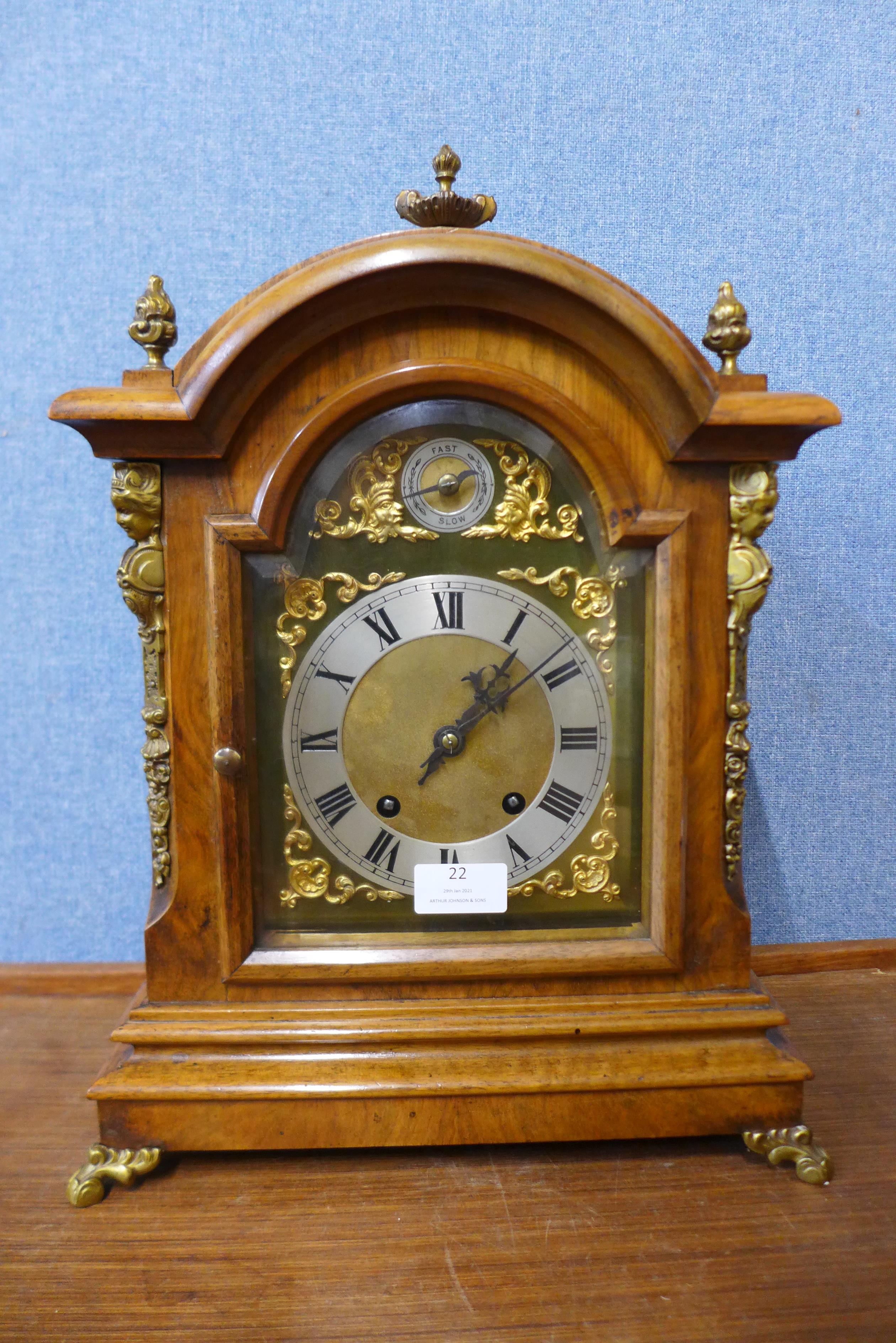 A George III style burr walnut and gilt metal bracket clock, 44cms h