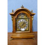 A George III style burr walnut and gilt metal bracket clock, 44cms h