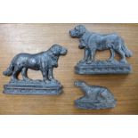 Three Victorian cast iron figures of dogs