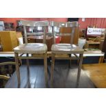 A pair of beech kitchen chairs