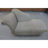 A Victorian style mahogany and upholstered chaise longue