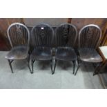 A set of four beech wheelback chairs