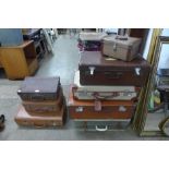 Seven assorted vintage suitcases