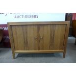 A Gordon Russell Double Helix teak sideboard, designed by David Booth and Judith Ledeboer for the