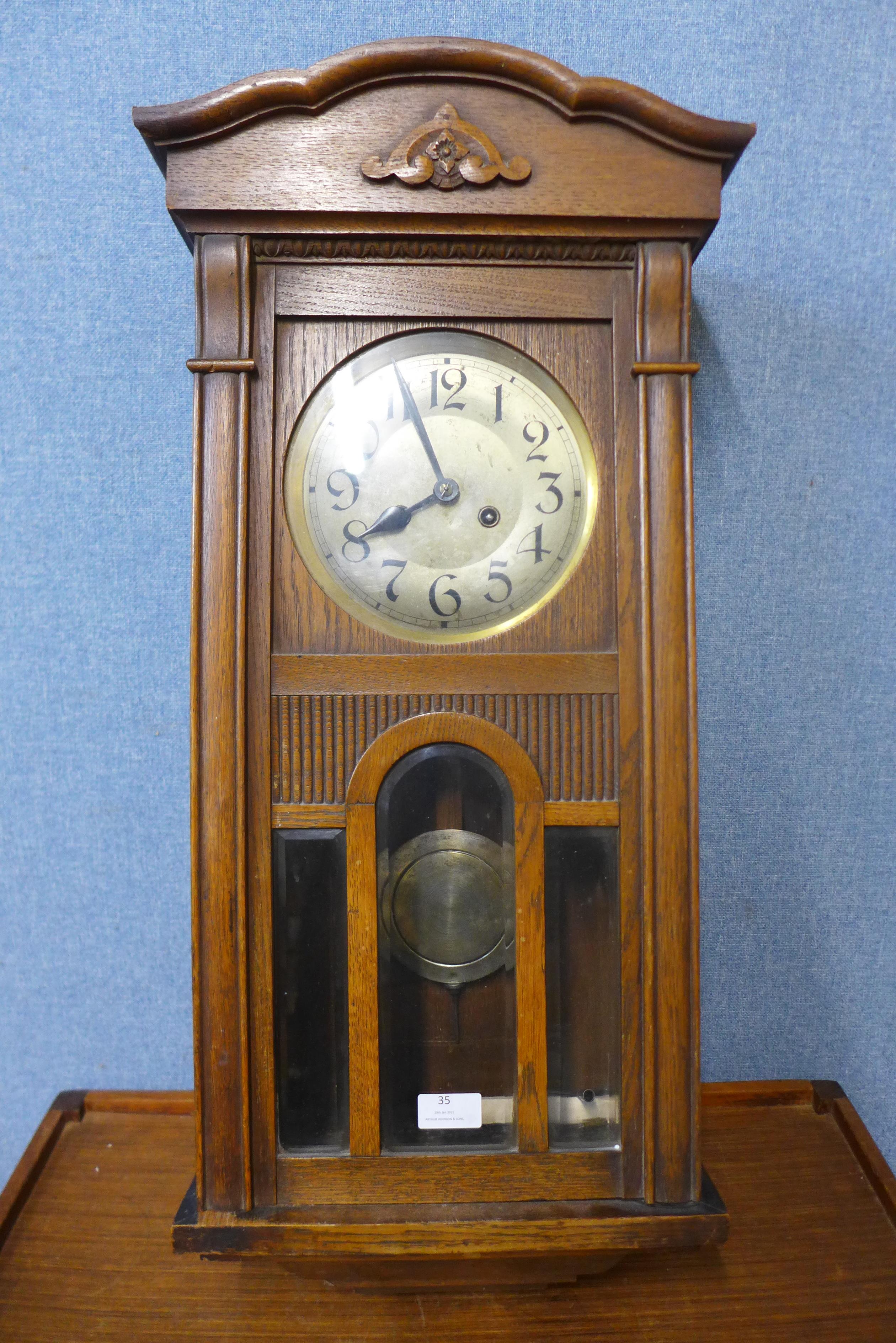 An oak wall clock