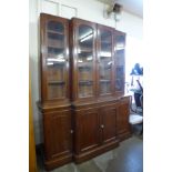 A Victorian mahogany breakfront library bookcase (lacking cornice)