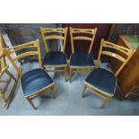 A set of four beech kitchen chairs