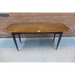 A tola wood and black lacquered coffee table