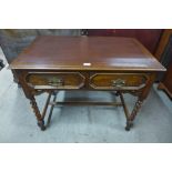 A 17th Century style oak barleytwist writing table