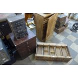 An oak ten drawer index cabinet, a Victorian pine four drawer chest and one other