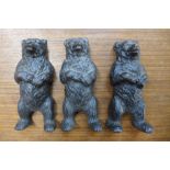Three small Victorian cast iron figures of bears