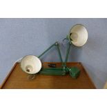 Two industrial green metal anglepoise lamps