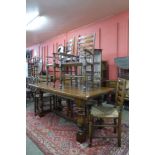 A 17th Century style oak refectory table (74cm h, 183 cms l, 81 cms w) and six oak ladderback rush