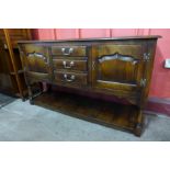 A 17th Century style oak credence cupboard