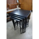 A black lacquered nest of quartetto tables