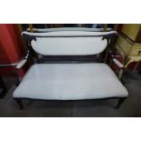 An Edward VII mahogany and upholstered salon settee, 87cms h, 136cms w, 65cms d