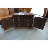 A 19th Century American Amberg's Patent mahogany fitted two door filing cabinet
