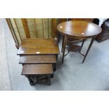 An Edward VII mahogany oval occasional table and an oak nest of tables