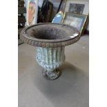 A Victorian cast iron campana shaped garden urn