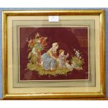 A Victorian silkwork embroidery of mother and child, 20 x 26cms, framed